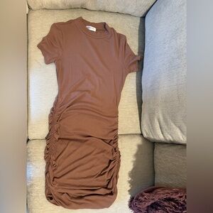 Light brown
knee length
jersey material
Stretchy 
Short Sleeve